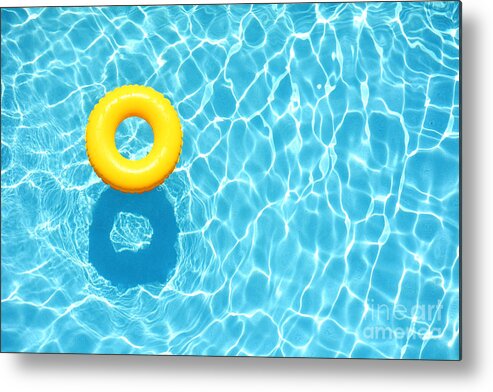Color Metal Print featuring the photograph Yellow Pool Float Ring Floating by Staciestauffsmith Photos