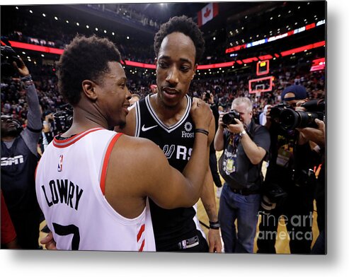 Nba Pro Basketball Metal Print featuring the photograph Demar Derozan and Kyle Lowry by Mark Blinch
