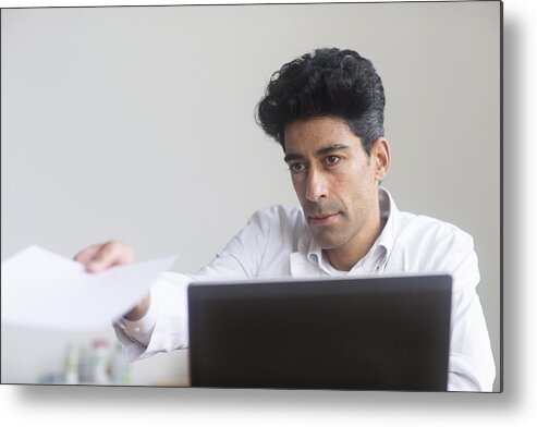 People Metal Print featuring the photograph Doctor working on laptop #1 by Sigrid Gombert/science Photo Library