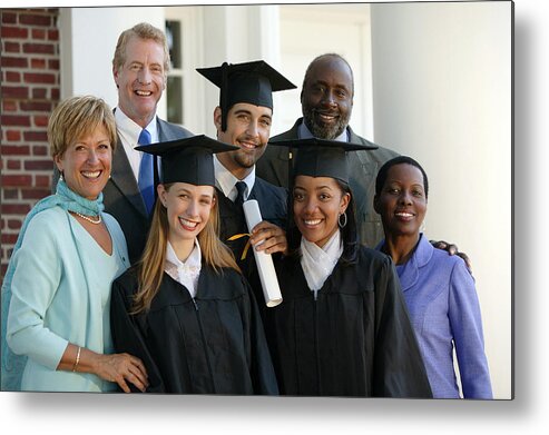 Young Men Metal Print featuring the photograph Graduates and parents #1 by Comstock Images