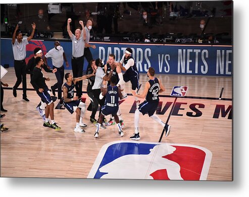 Luka Doncic Metal Print featuring the photograph Los Angeles Clippers v Dallas Mavericks - Game Four #1 by David Dow