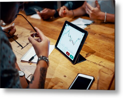 Hipster Metal Print featuring the photograph Mixed group of millennial aged friends discuss investing and cryptocurrency trading #1 by Trevor Williams