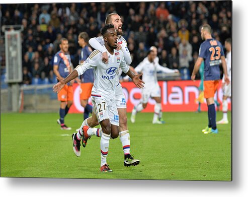Scoring Metal Print featuring the photograph Montpellier Herault SC v Olympique Lyonnais - Ligue 1 #1 by Pascal Rondeau