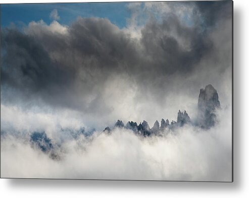 Mountain Peak Metal Print featuring the photograph Mountain peaks between the clouds by Michalakis Ppalis