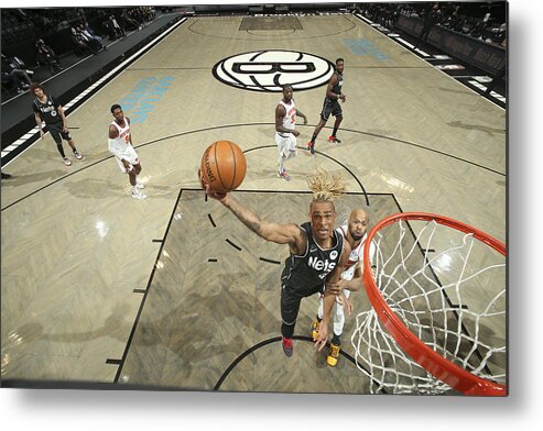 Nba Pro Basketball Metal Print featuring the photograph New York Knicks v Brooklyn Nets by Nathaniel S. Butler