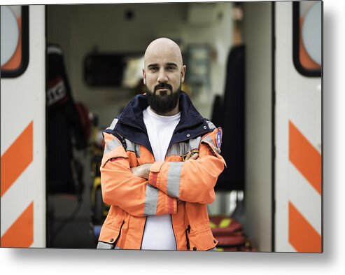 People Metal Print featuring the photograph Portrait of a paramedic #1 by Vm