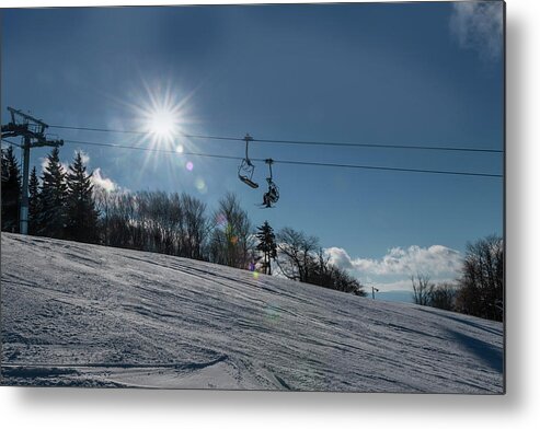 Ski Lift Metal Print featuring the photograph Ski lift with sunburst on winter day #1 by Dan Friend