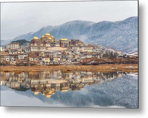 Chinese Culture Metal Print featuring the photograph Songzanlin Temple also known as the Ganden Sumtseling Monastery, is a Tibetan Buddhist monastery in Zhongdian city( Shangri-La), Yunnan province China and is closely Potala Palace in Lhasa #1 by Suttipong Sutiratanachai