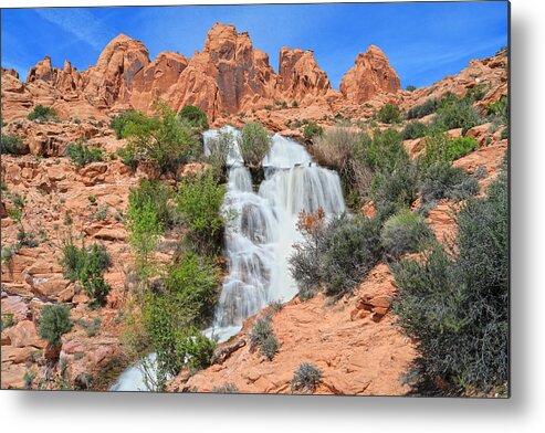 Scenics Metal Print featuring the photograph Waterfall between red sandtsone rocks in a desert landscape #1 by Rainer Grosskopf