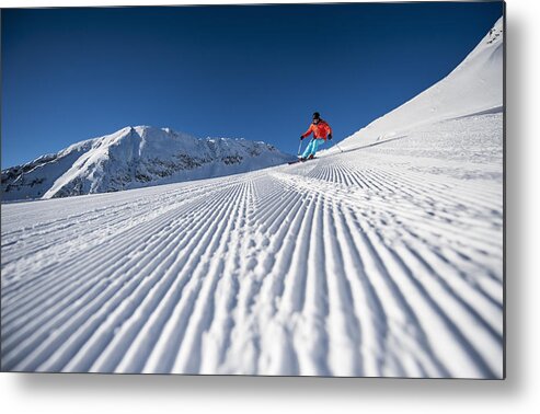Mid Adult Metal Print featuring the photograph Austria, Salzburg, Mid adult man skiing in mountain of Altenmarkt Zauchensee #2 by Westend61