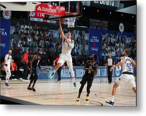 Luka Doncic Metal Print featuring the photograph Dallas Mavericks v LA Clippers - Game One #2 by David Sherman