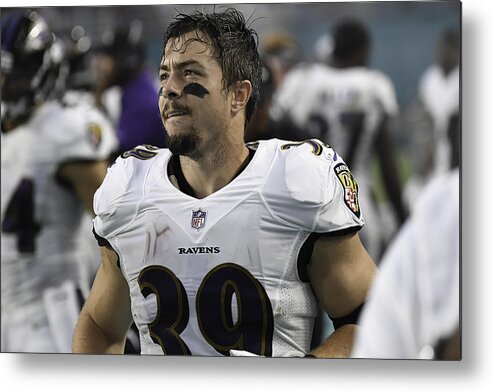 Miami Gardens Metal Print featuring the photograph Baltimore Ravens v Miami Dolphins #3 by Ron Elkman/Sports Imagery