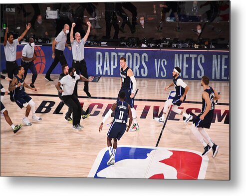 Luka Doncic Metal Print featuring the photograph Los Angeles Clippers v Dallas Mavericks - Game Four by David Dow