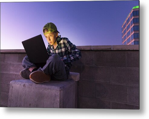 Dark Web Metal Print featuring the photograph A teenage boy hacking with a laptop computer to commit cyber crime #4 by Robb Reece
