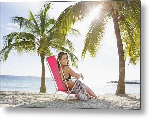 White People Metal Print featuring the photograph Woman relaxing on beach lounger #4 by Felix Wirth