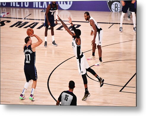 Playoffs Metal Print featuring the photograph Los Angeles Clippers v Dallas Mavericks - Game Four by David Dow