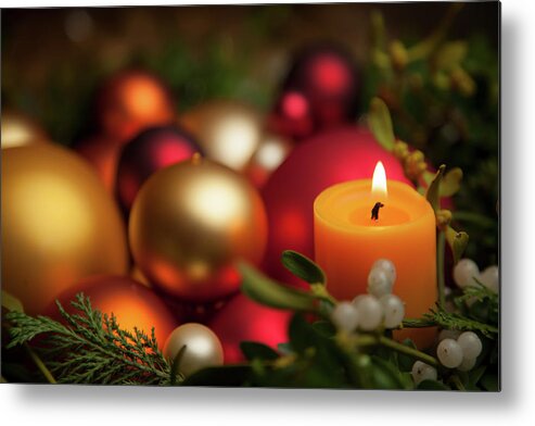 Christmas Metal Print featuring the photograph A candle is burning christmas decoration by Karen Kaspar