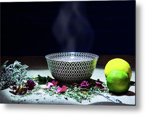 Tea Metal Print featuring the photograph A drinking bowl with tea and herbs. by Bernhard Schaffer