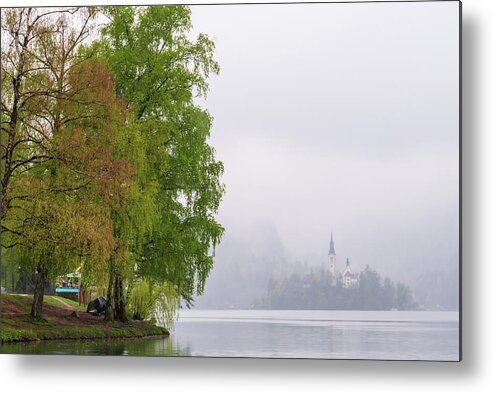 Slovenia Metal Print featuring the photograph A rainy day in Bled, Slovenia by Mirko Chessari