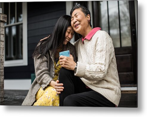 Atlanta Metal Print featuring the photograph Adult woman and senior mother talking on front porch by MoMo Productions
