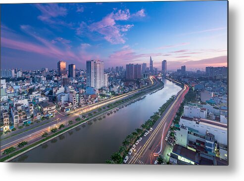 Ho Chi Minh City Metal Print featuring the photograph Aerial sunset view of houses and Business and Administrative Center of Ho Chi Minh city on NHIEU LOC canal by Ho Ngoc Binh