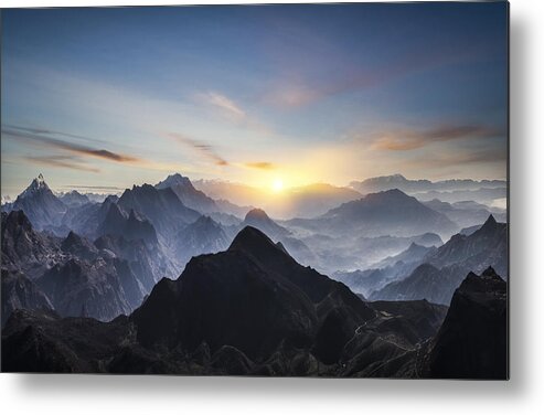 Scenics Metal Print featuring the photograph Aerial view of misty mountains at sunrise by Guvendemir