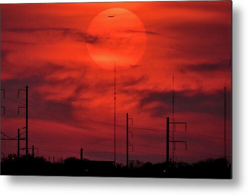 Sunset Metal Print featuring the photograph Airplane Passing in Front of Setting Sun Over Philadelphia by Linda Stern