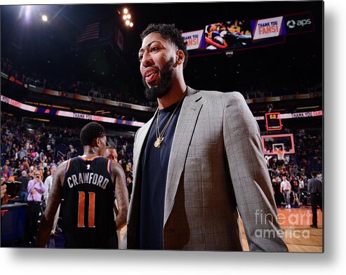 Following Metal Print featuring the photograph Anthony Davis by Michael Gonzales