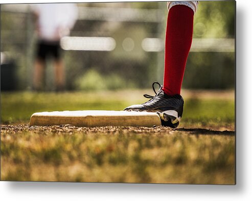 Children Only Metal Print featuring the photograph Baseball player touching base by Sollina Images
