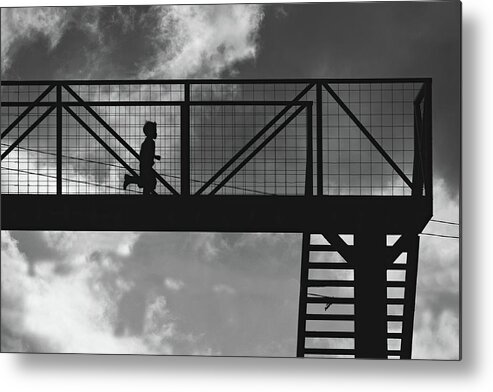 Silhouette Metal Print featuring the photograph Boy running on highway bridge in Guatemala BW by Tatiana Travelways
