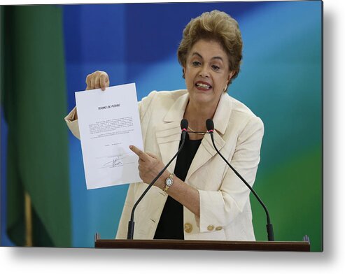 People Metal Print featuring the photograph Brazil's former president, Luiz Inacio Lula da Silva, is sworn in as the new chief of staff for embattled President Dilma Rousseff by Igo Estrela