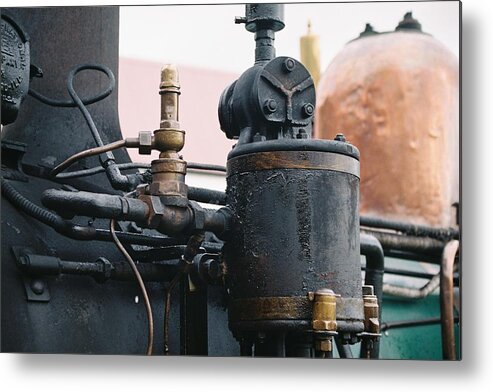 Castiron Metal Print featuring the photograph Cast Iron and Copper by Stephen Mitchell