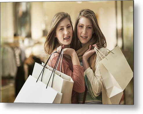 White People Metal Print featuring the photograph Caucasian girls carrying shopping bags by Jose Luis Pelaez Inc