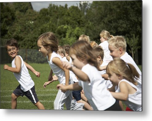 4-5 Years Metal Print featuring the photograph Children (5-7) running on field by Ableimages
