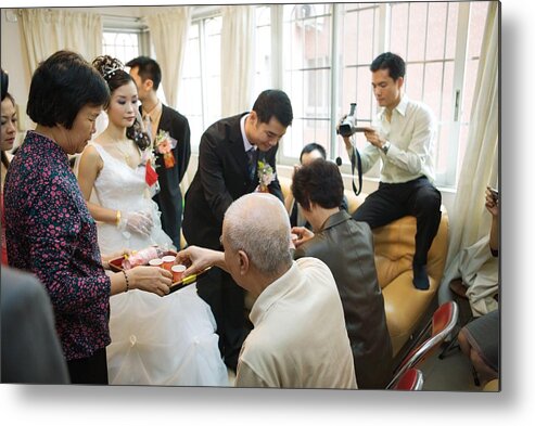 Young Men Metal Print featuring the photograph Chinese wedding tea ceremony by PhotoAlto/James Hardy