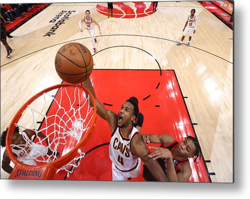 Evan Mobley Metal Print featuring the photograph Cleveland Cavaliers v Toronto Raptors by Vaughn Ridley