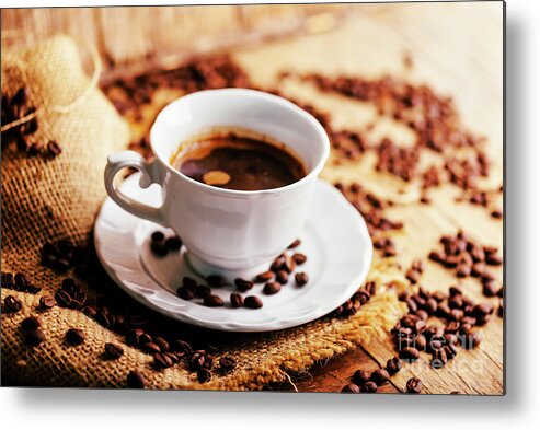Coffee Metal Print featuring the photograph Closeup of coffee cup and coffee beans with vintage burlap on ru by Jelena Jovanovic
