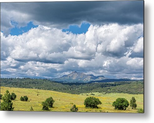 Chama Metal Print featuring the photograph Clouds Build Over Landscape of Chama New Mexico by Debra Martz