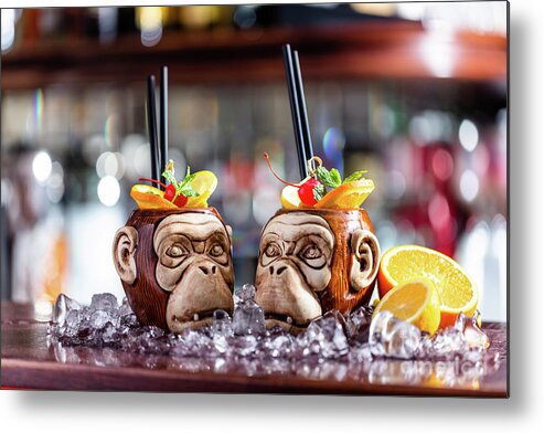 Cocktail Metal Print featuring the photograph Coctail in monkey mugs on bar counter by Michal Bednarek