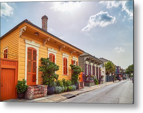 Orange Color Metal Print featuring the photograph Colorful houses in French Quarter by Peter Unger