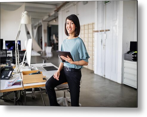 New Business Metal Print featuring the photograph Confident female business professional with digital tablet by Luis Alvarez