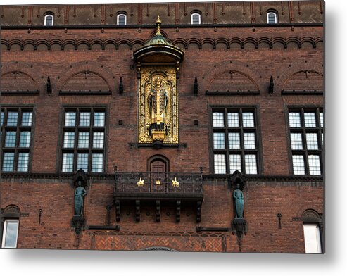 Copenhagen Metal Print featuring the photograph Copenhagen city hall facade with its richly ornamented front, of the gilded statue of Absalon a Danish statesman and prelate of the Catholic Church, famous person from Denmark by Gustavo Muñoz Soriano