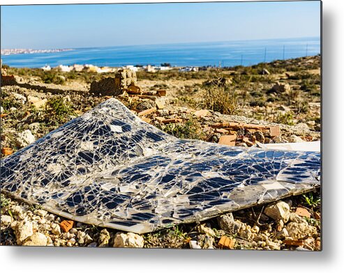 Social Issues Metal Print featuring the photograph Damaged solar photovoltaic panel by Voyagerix