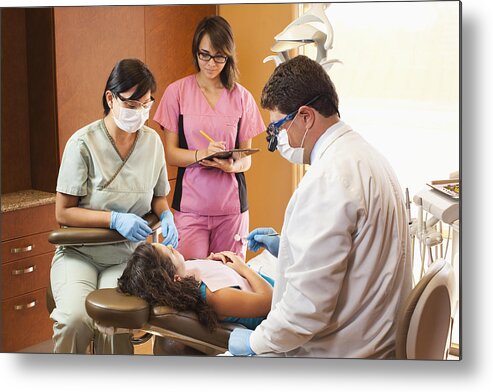 California Metal Print featuring the photograph Dentist and hygienists examining patient by Kingfisher Productions