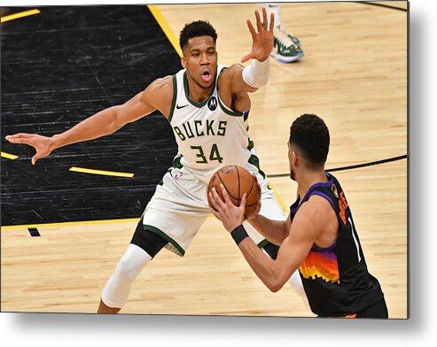 Playoffs Metal Print featuring the photograph Devin Booker and Giannis Antetokounmpo by Jesse D. Garrabrant