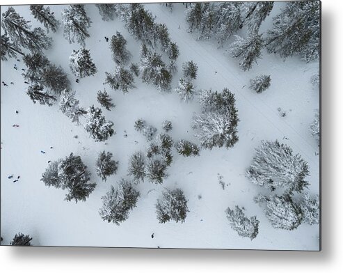 Winter Metal Print featuring the photograph Drone aerial scenery of mountain snowy forest and people playing in snow. Wintertime season by Michalakis Ppalis