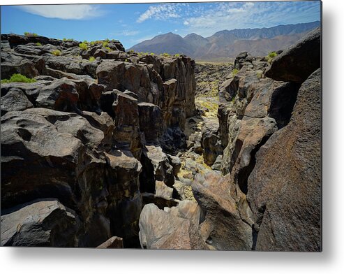 Fossil Falls Metal Print featuring the photograph Fossil Falls by Brett Harvey