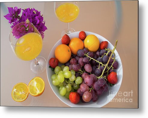 Orange Juice Metal Print featuring the photograph Freshly squeezed orange juice and delicious grapes by Adriana Mueller