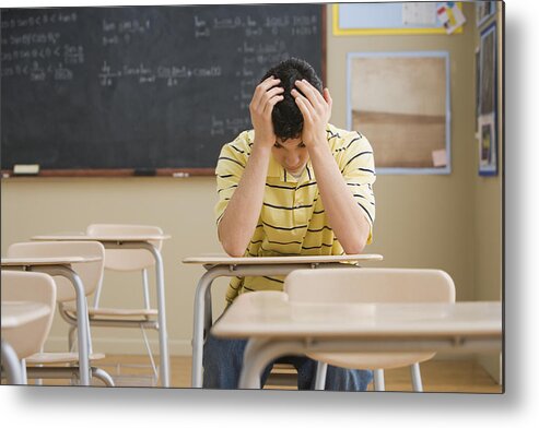 Problems Metal Print featuring the photograph Frustrated Teenage Boy in Classroom by Fuse