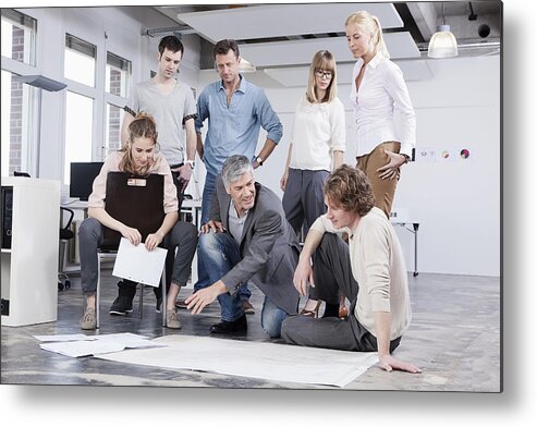 Expertise Metal Print featuring the photograph Germany, Bavaria, Munich, Men and women discussing in office by Westend61